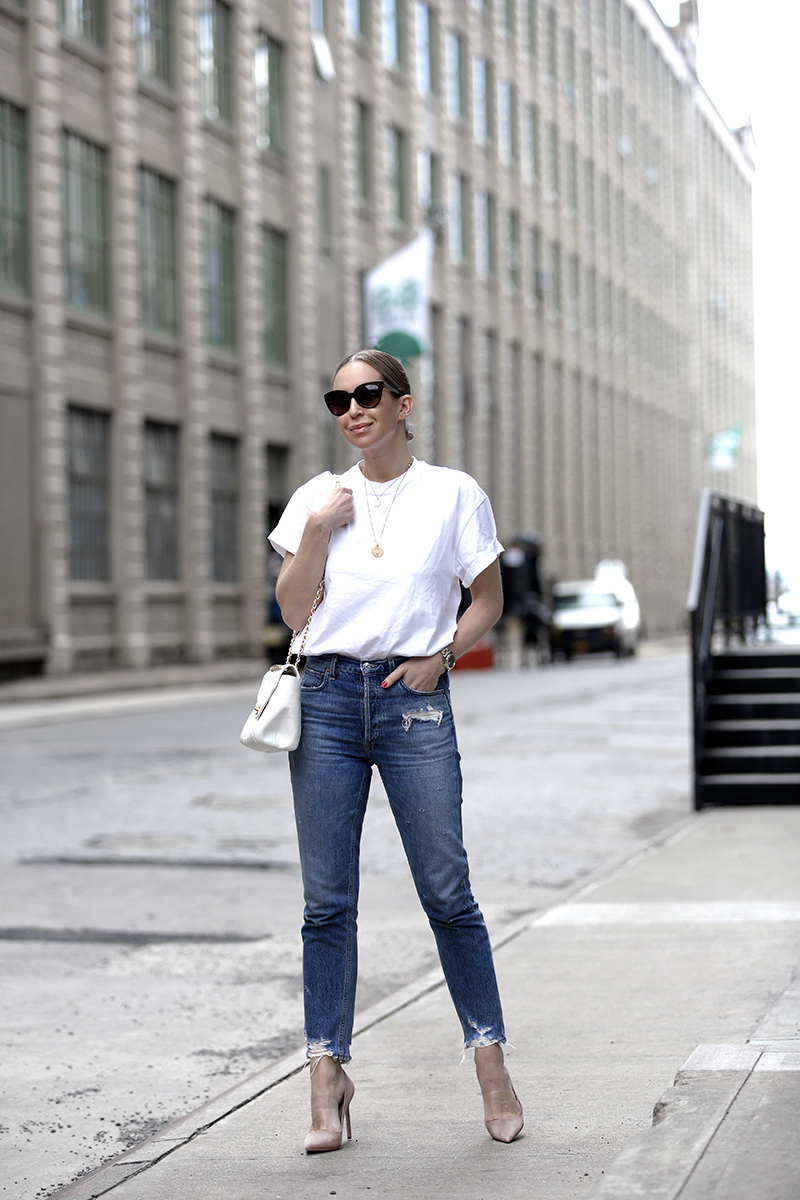 Simple Jeans Outfit: Topshop White Boxy Roll T-Shirt, AGolde Jaime High-Rise Classic Jeans, Manolo Blahnik BB Pointy Toe Taupe Suede Pump, Chanel White Bag, Layered Necklaces, Helena of Brooklyn Blonde